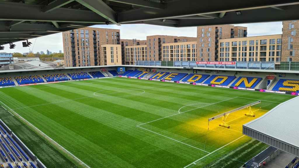 AFC Wimbledon's Flooded Pitch: Sinkhole Crisis Forces Newcastle Match Move