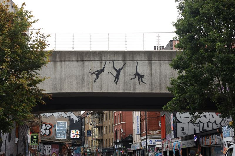 Banksy's Gorilla Unleashes Animals From London Zoo: A Masterpiece in Street Art?