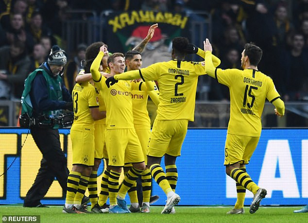 Borussia Dortmund's Away Woes Continue as Augsburg Secures Shocking 2-1 Win