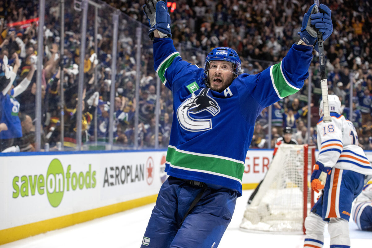 Calgary Flames Forward Kevin Rooney Exits Game After Scary Hit by Canucks' J.T. Miller