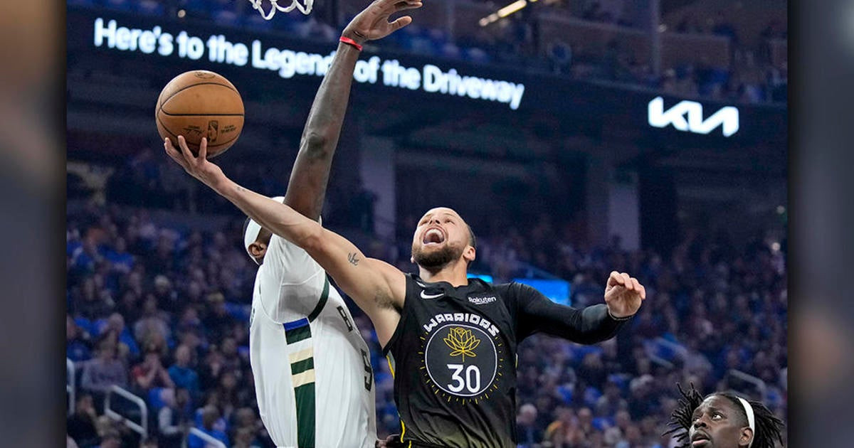 Curry's 38 Points Lead Warriors to Victory Over Bucks: A Thrilling NBA Showdown