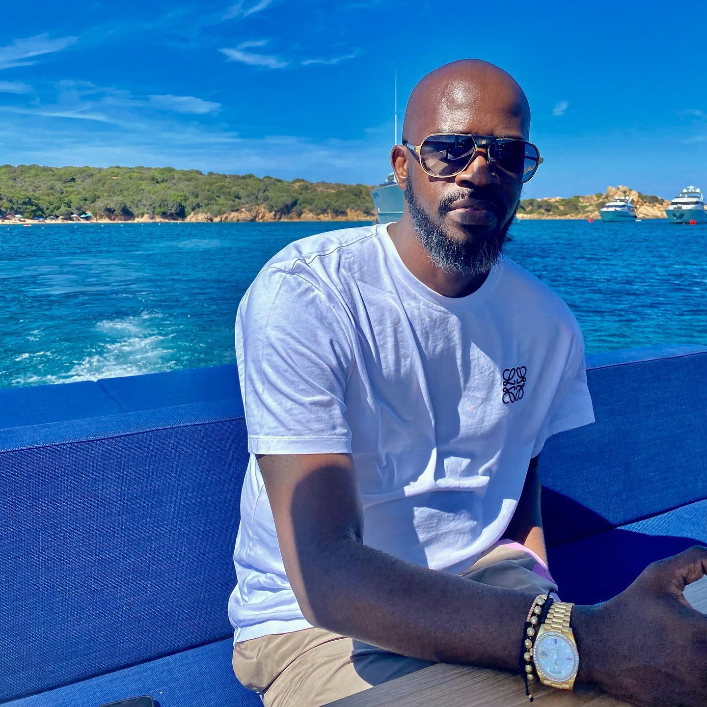 DJ Black Coffee Spotted Hanging Out with Will Smith and India Martinez in Ibiza