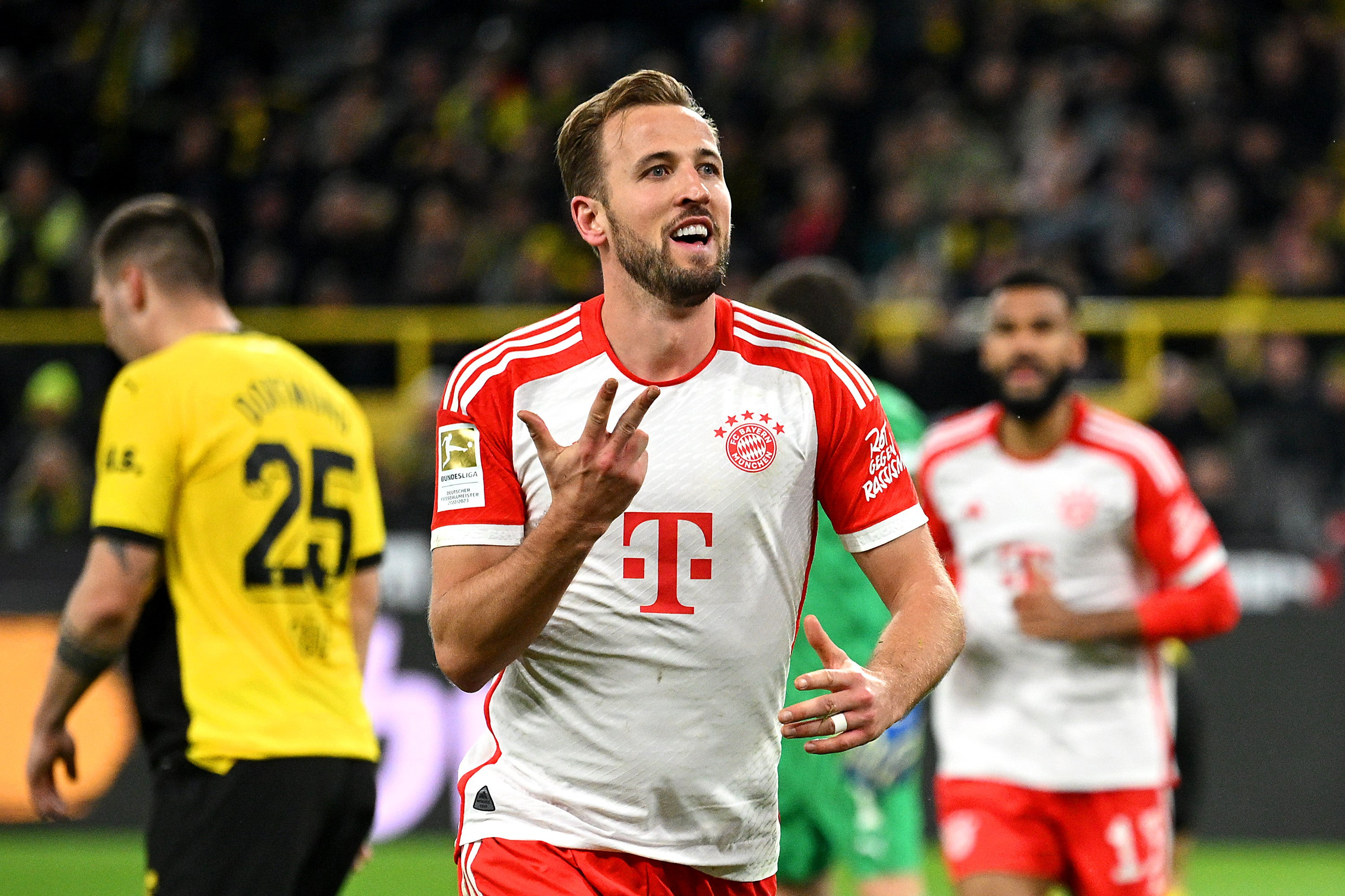 Harry Kane Injured as Bayern Munich's Unbeaten Run Ends in a Thrilling 1-1 Draw Against Dortmund