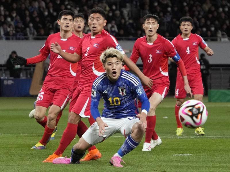 Japan's Unbeaten Streak Faces Test Against Rejuvenated Australia in World Cup Qualifier