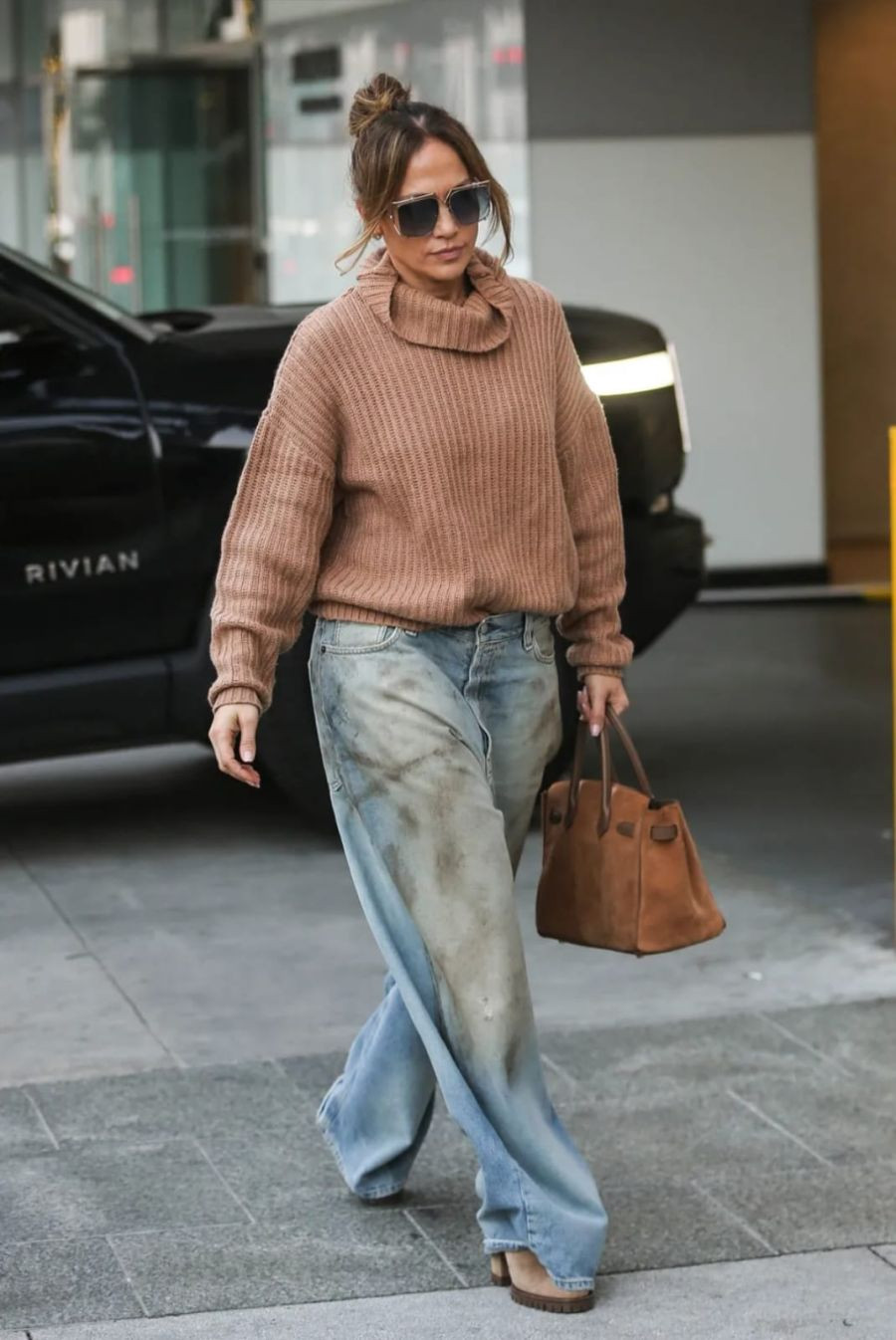 Jennifer Lopez's Cozy Christmas Eve Look: UGGs, Ripped Jeans, and Unbelievable Comfort