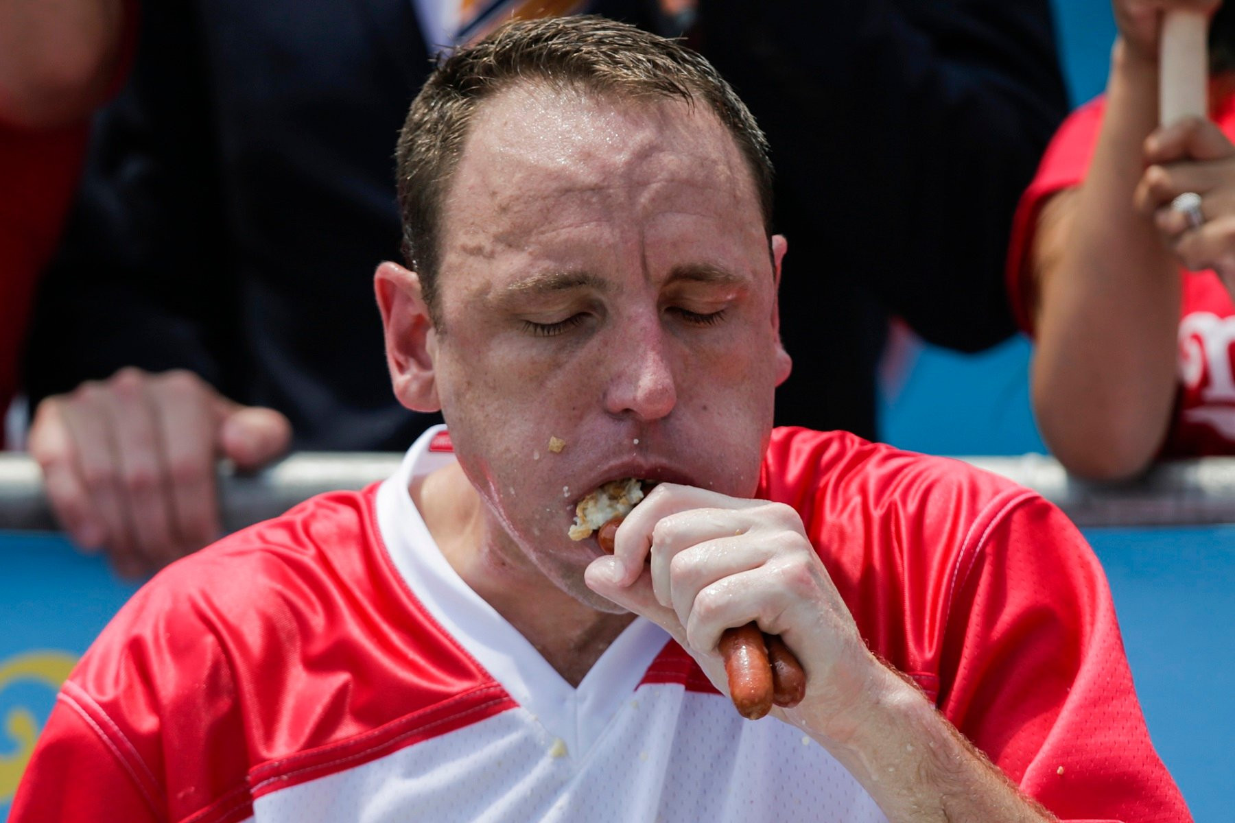 Joey Chestnut Crushes World Record, Devours 83 Hot Dogs in Netflix Eating Contest