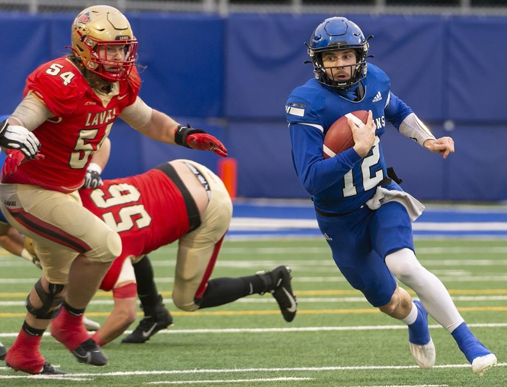 Le Rouge et Or bat les Carabins dans un Match Épique avec un Botté de Placement Record