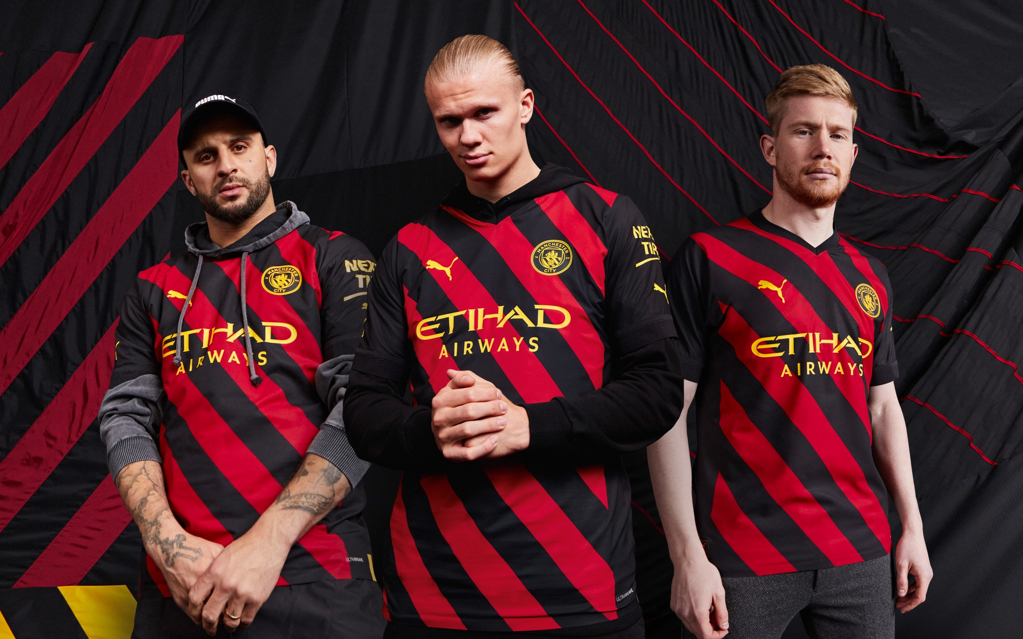 Manchester City Unveils New 'Definitely City' Kit Designed By Noel Gallagher