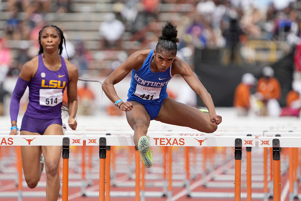 Masai Russell Wins Gold in Thrilling Photo Finish at the Paris Olympics