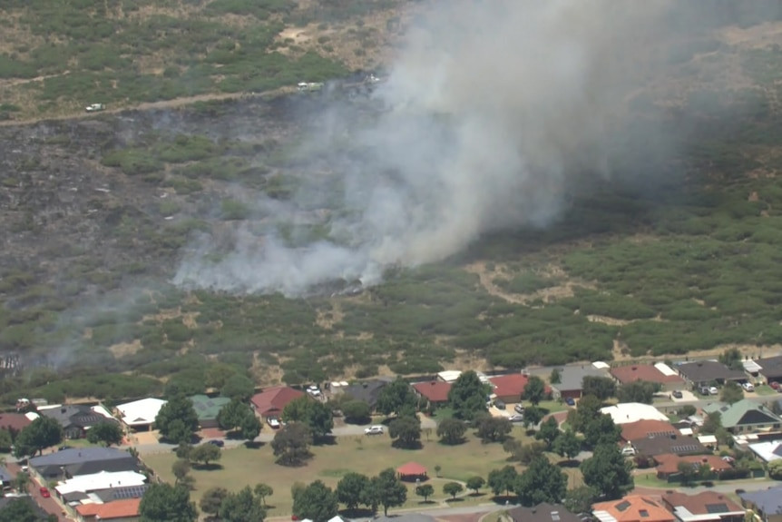 Port Kennedy Bushfire Downgraded: Residents Urged to Stay Alert as Firefighters Battle Blaze