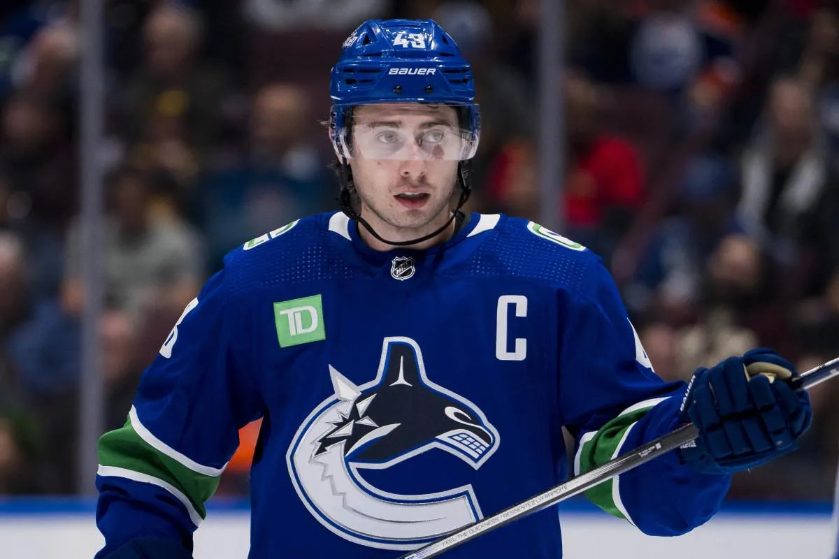 Quinn Hughes' Magic: Canucks' Captain Leads Stunning Victory Over Capitals, Ending Their 12-Game Point Streak!