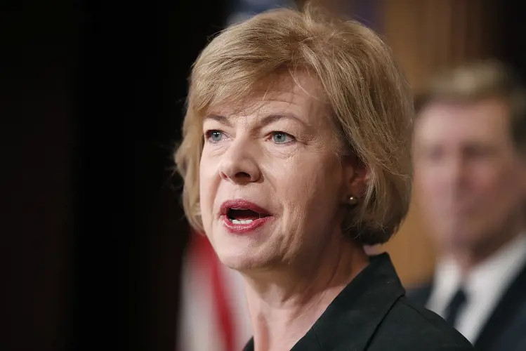 Tammy Baldwin's Partner's Wall Street Gig Raises Ethics Concerns: Is This a Conflict of Interest?