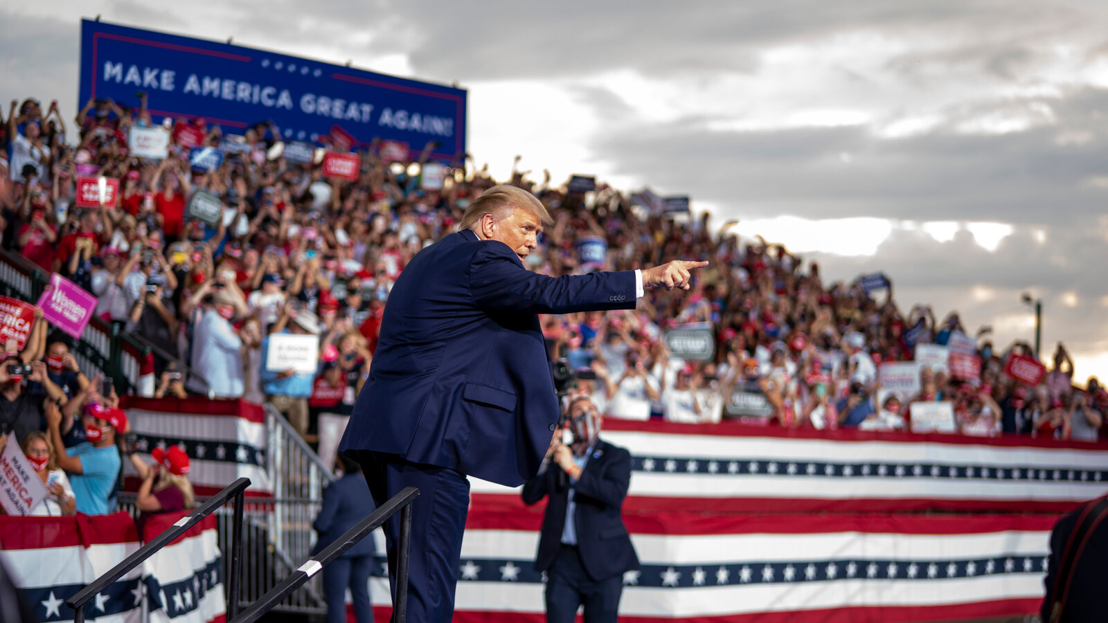 Trump Brags About His Hair at Rally, Jokes About a Supporter's 'Rug'