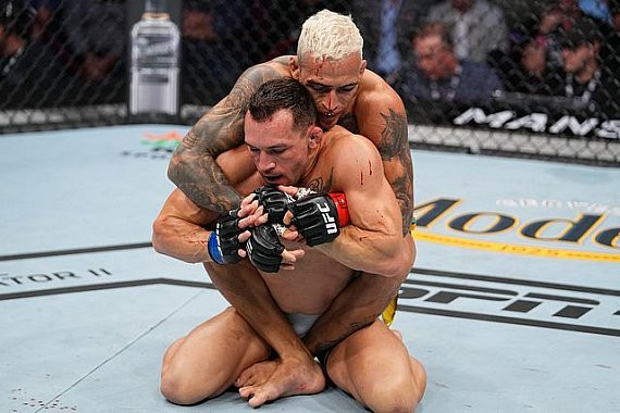 UFC 309: Oliveira Survives Chandler's Furious Rally to Secure Unanimous Decision Win