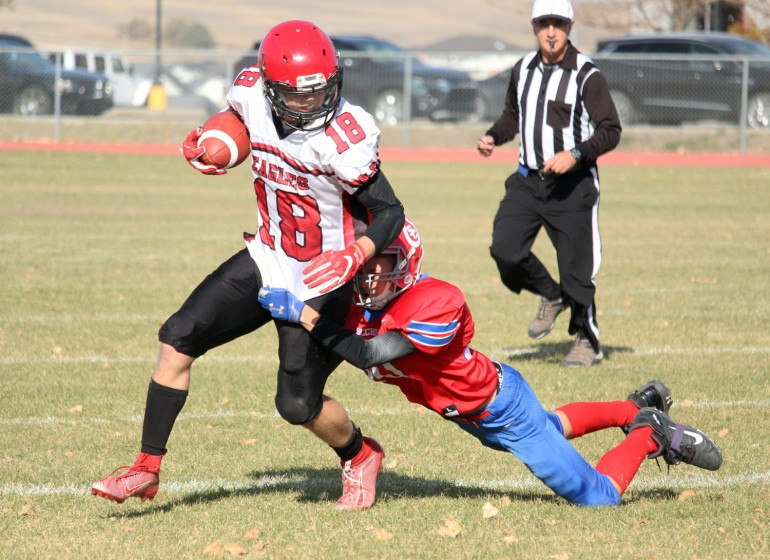 Weyburn Eagles Soar to Victory in Season Opener: Defense Dominates Yorkton Raiders