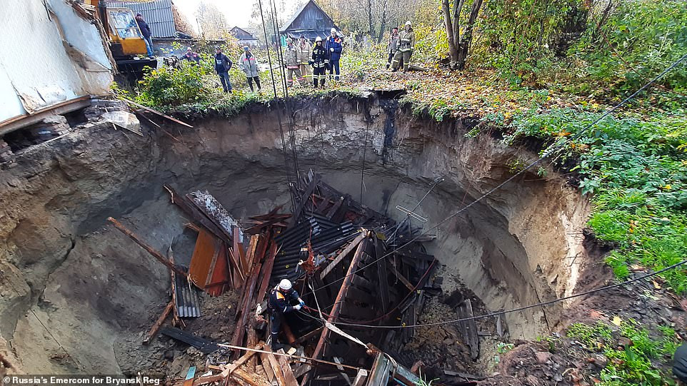 Woman Vanishes in Kuala Lumpur Sinkhole: Rescue Efforts Hampered by Strong Water Current