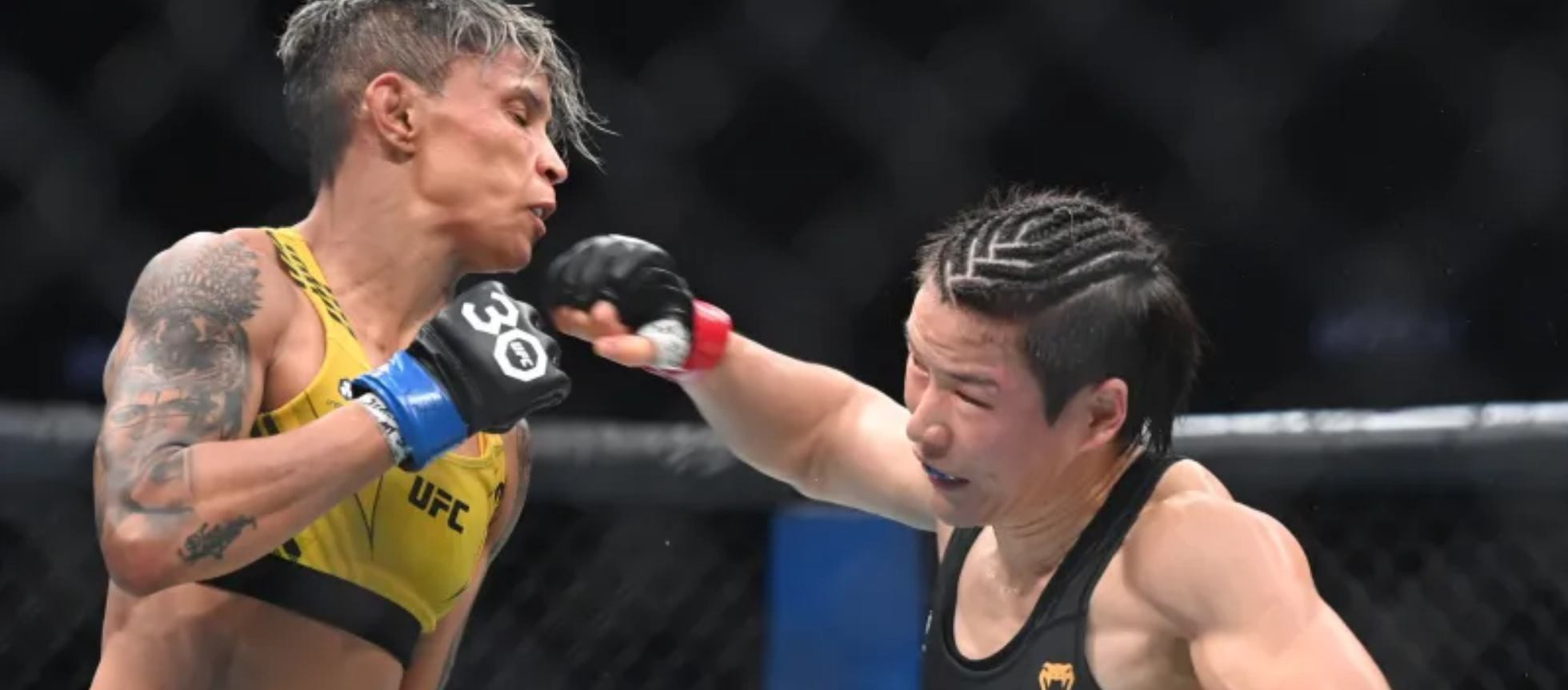 Zhang Weili Dominates Suarez, Retains Strawweight Title at UFC 312: A Stunning Display of Skill and Power