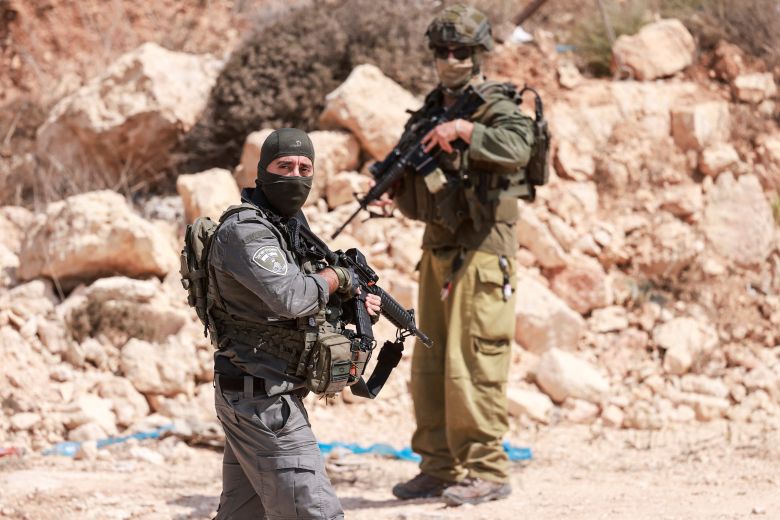 Israeli soldiers arrive in Qusra on Saturday. Most of the international community considers settlements there illegal under international law.
